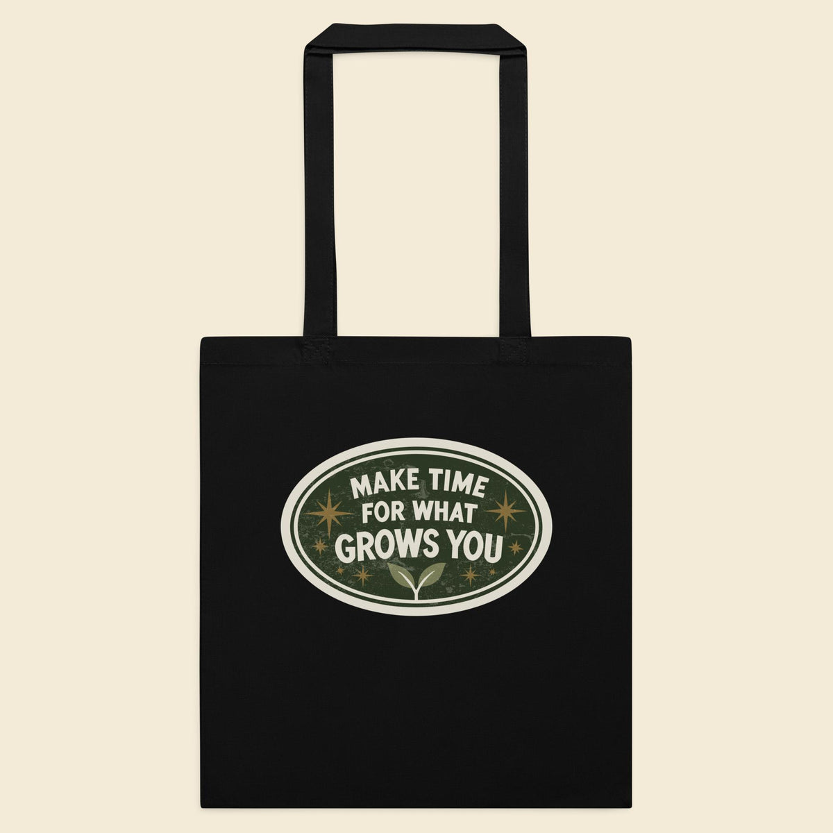 Black cotton tote bag with Make Time for What Grows You artwork