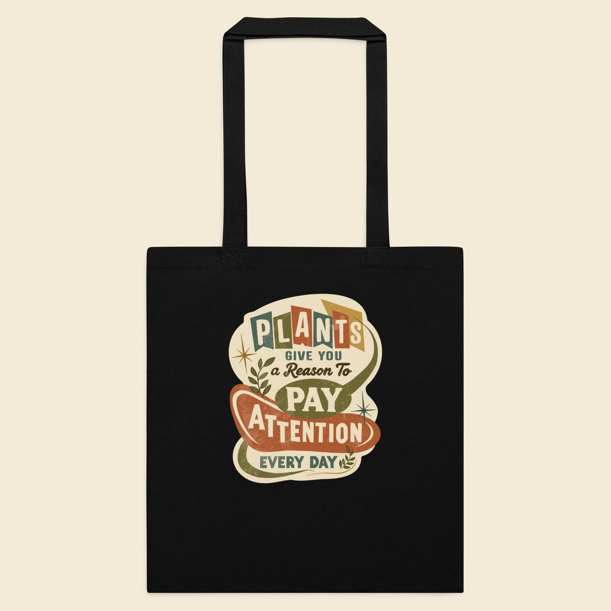 Black cotton tote bag with Plants Give You a Reason artwork