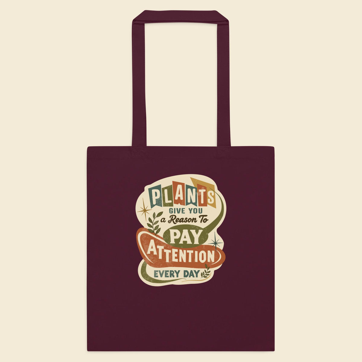 Burgundy cotton tote bag with Plants Give You a Reason artwork