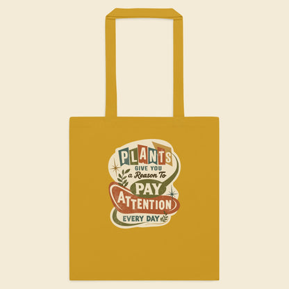 Mustard cotton tote bag with Plants Give You a Reason artwork