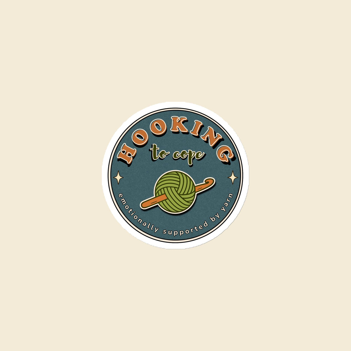 Hooking to Cope round crochet badge magnet with a yarn ball and hook, 3 × 3 in