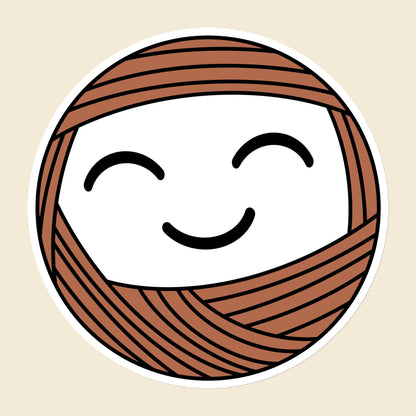 Mellow, a smiling terracotta Yarn Creature magnet, 6 × 6 in, on a cream background