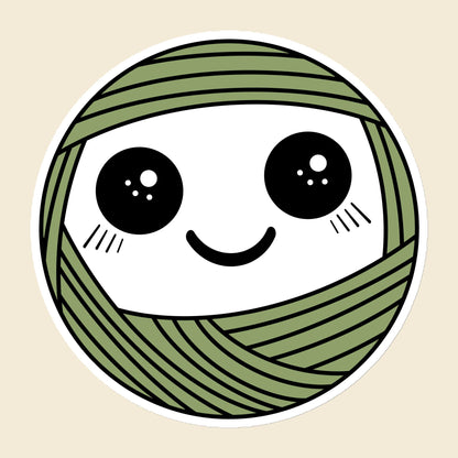 Pip, a sparkly-eyed, blushing sage green Yarn Creature magnet, 6 × 6 in, on a cream background