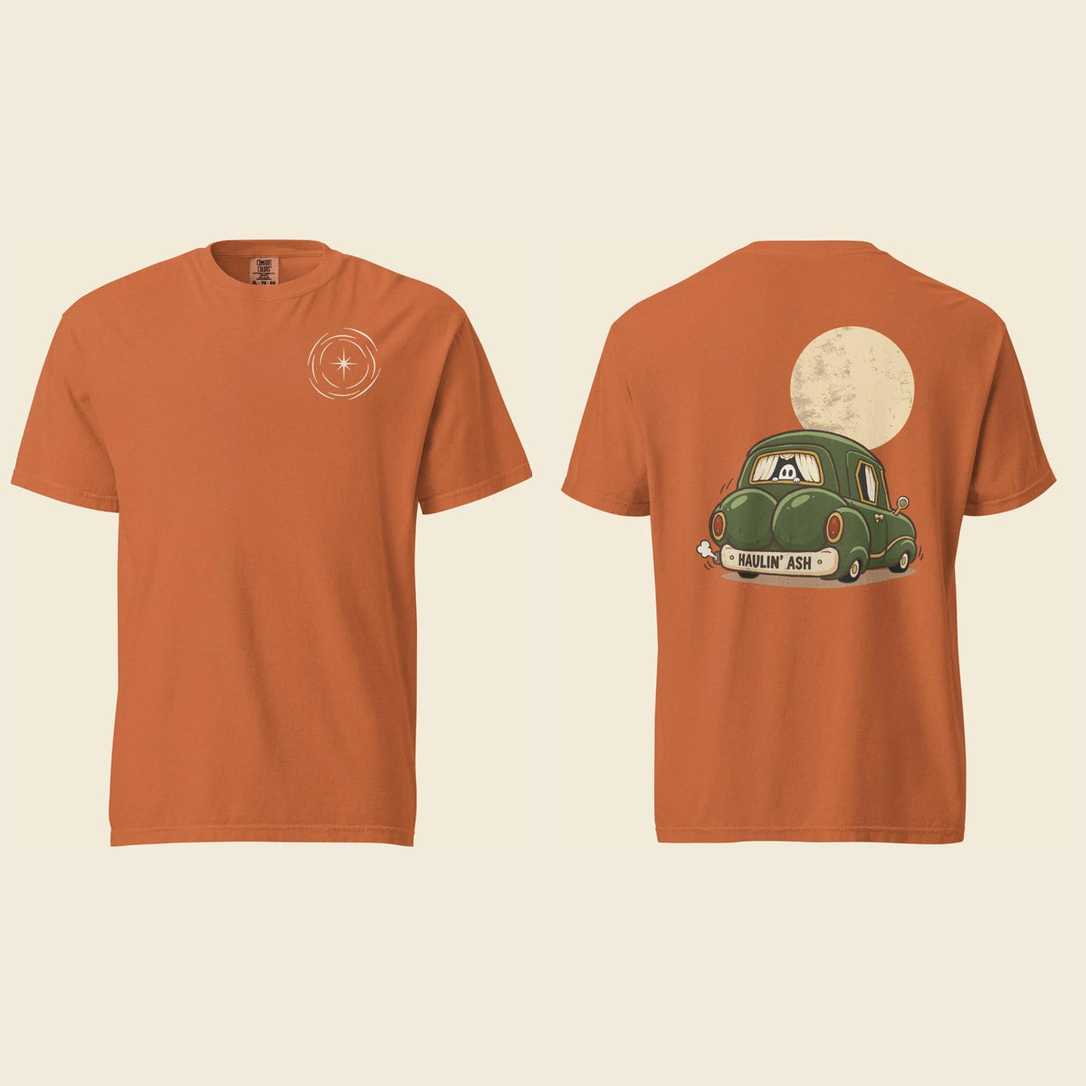 Front and back of a yam heavyweight T-shirt: a small cream vortex on the chest and Haulin’ Ash artwork of a green car under a full moon on the back