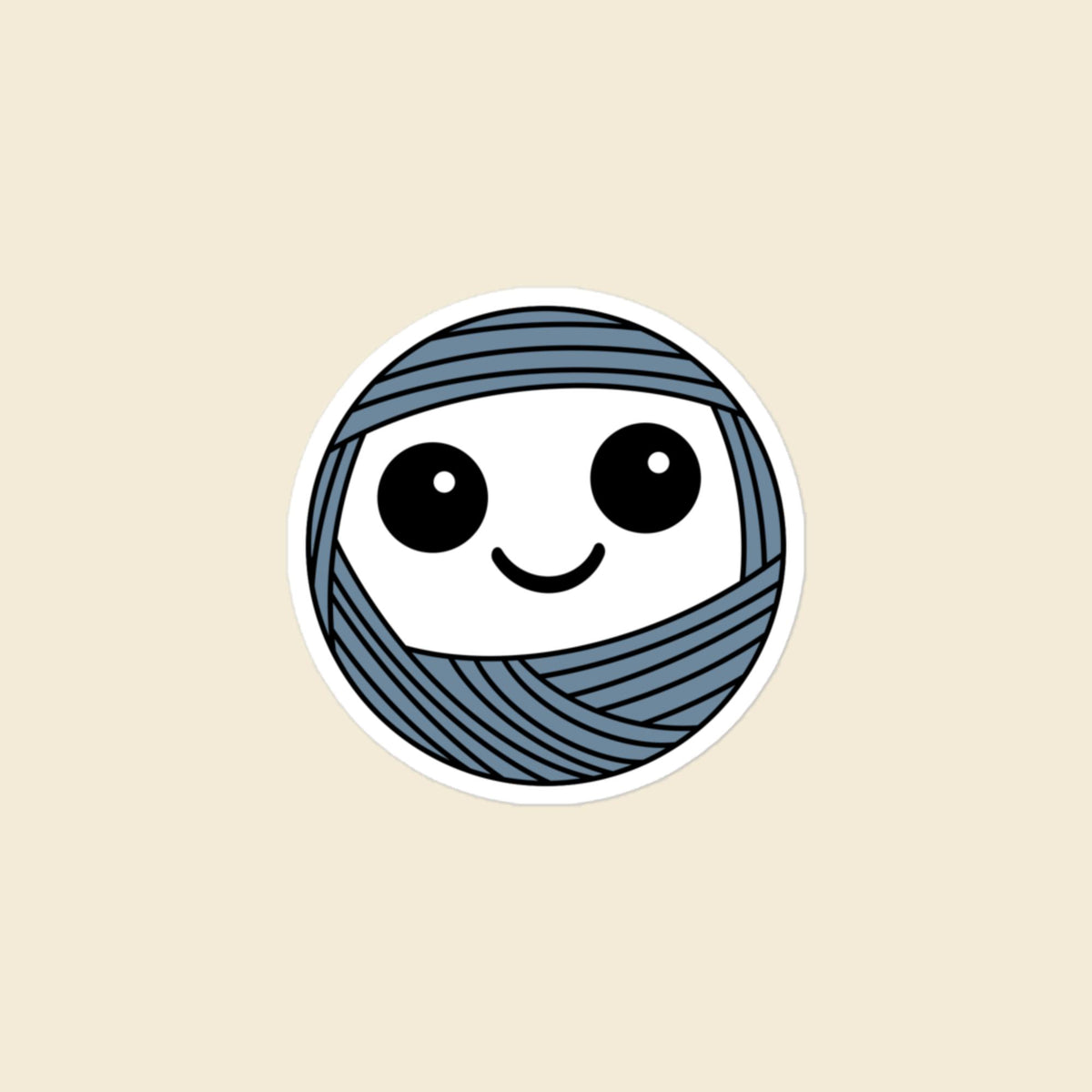 Boggle, a wide-eyed dusty blue Yarn Creature sticker, 3 × 3 in, on a cream background
