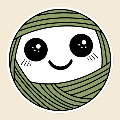 Pip, a sparkly-eyed, blushing sage green Yarn Creature sticker, 5.5 × 5.5 in, on a cream background