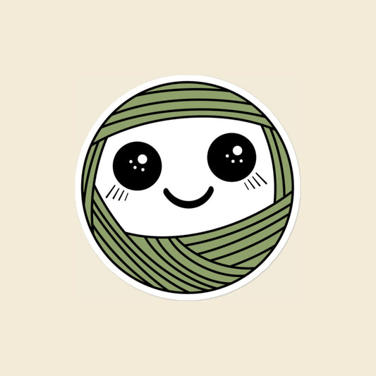 Pip, a sparkly-eyed, blushing sage green Yarn Creature sticker, 4 × 4 in, on a cream background