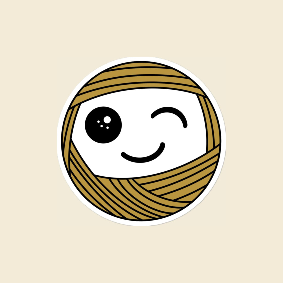 Wink, a winking mustard Yarn Creature sticker, 4 × 4 in, on a cream background